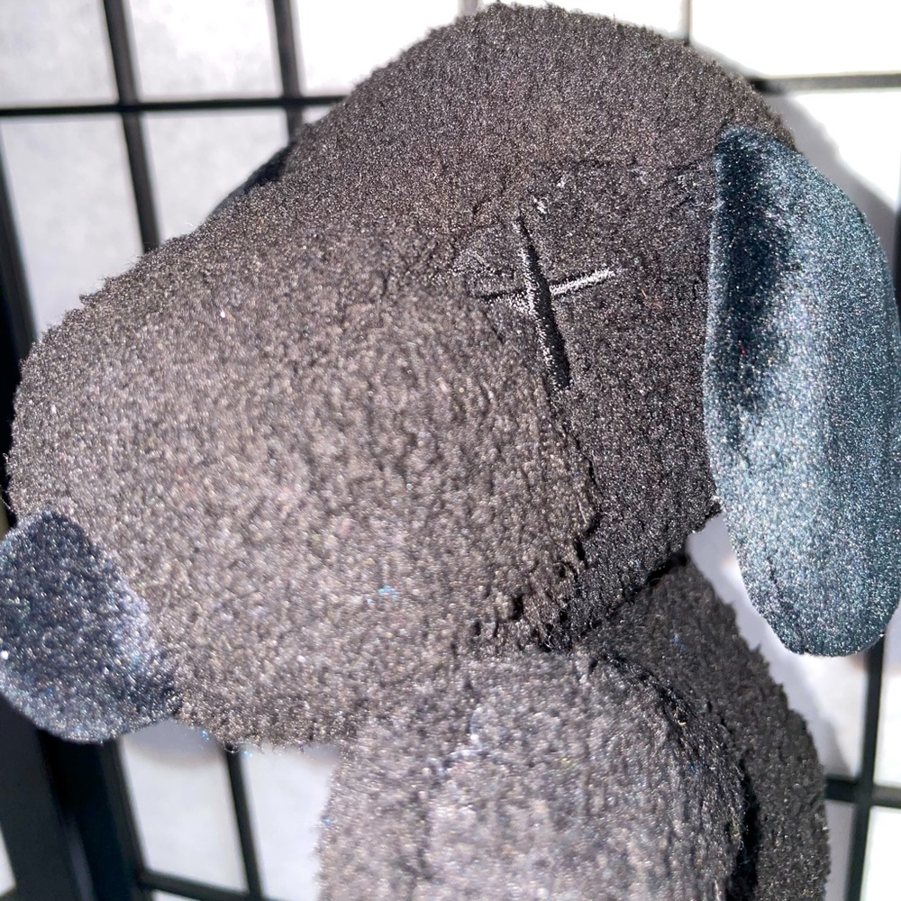 KAWS x Uniqlo Mini Snoopy